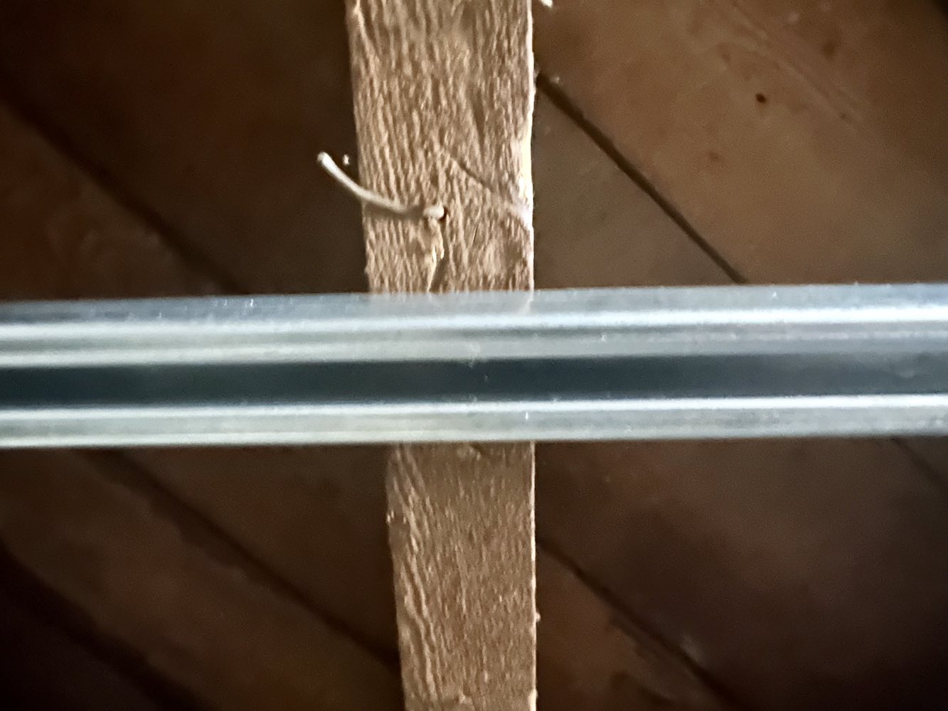 track attached to rafter